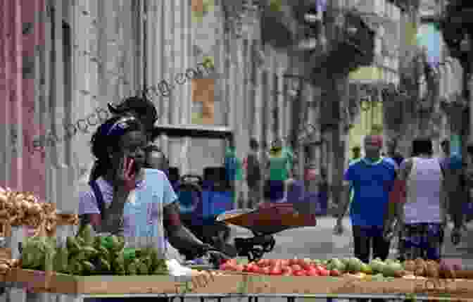 A Bustling Street Vendor In Havana, Surrounded By Colorful Fruits And Vegetables. Havana: A Subtropical Delirium Mark Kurlansky