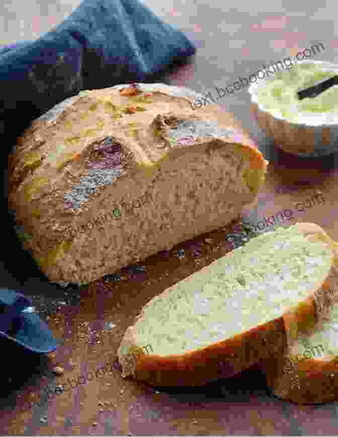 A Golden Brown Loaf Of Artisan Bread, Freshly Baked And Steaming Bread Issues: The State Of Modern Bread And A Definitive Recipes To Baking Your Own