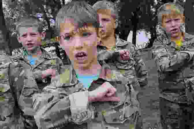 A Soldier In Uniform Stands In Front Of A Group Of Children In A War Torn Country. Caught In The Crossfire: An Australian Peacekeeper Beyond The Front Line