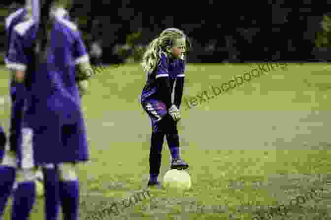 Julie Foudy As A Young Girl Playing Soccer On The Field With Julie Foudy (Athlete Biographies)