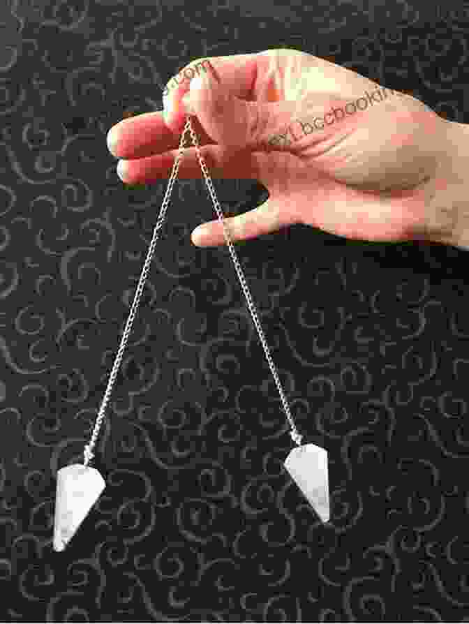 Pendulum Being Used For Energy Healing Using Pendulums In Spiritual Practices: Spiritual Pocket Guide