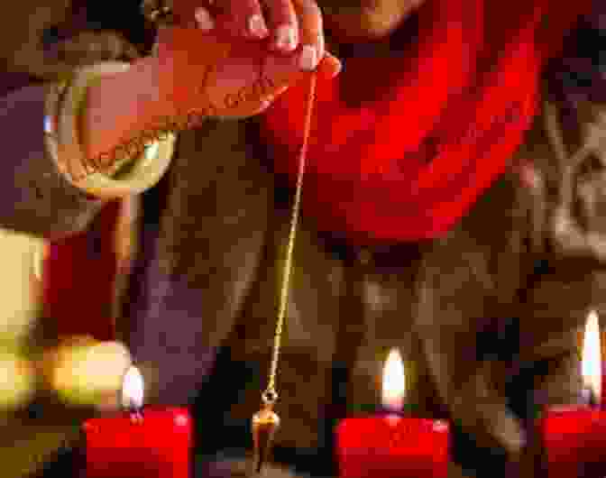 Person Using A Pendulum For Dowsing Using Pendulums In Spiritual Practices: Spiritual Pocket Guide