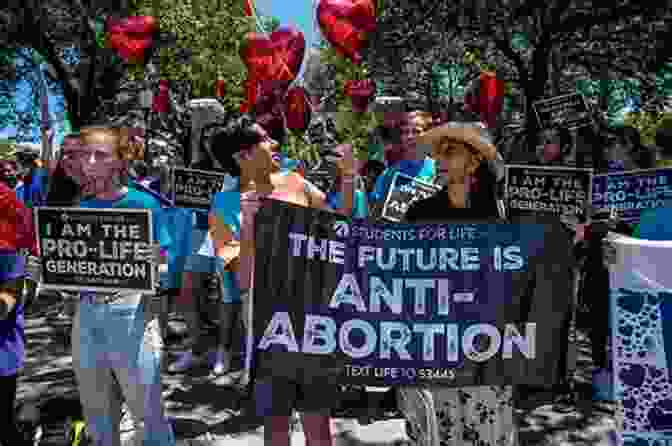 Protesters Holding Signs Against Forced Abortions Defiant Birth: Women Who Resist Medical Eugenics