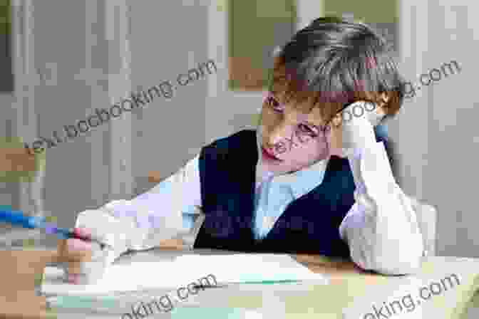 Student Studying Diligently At A Desk Organizing The Disorganized Child: Simple Strategies To Succeed In School